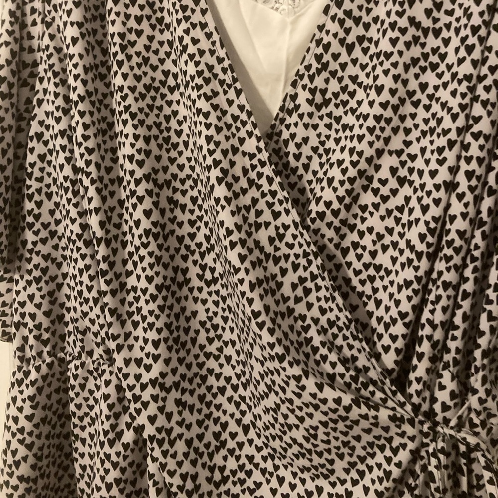 Ladies Plus Size 3x Black and White Wrap Blouse with heart pattern.